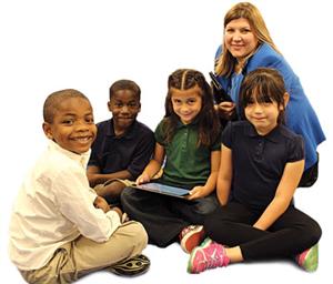 Principal with Students and iPads 